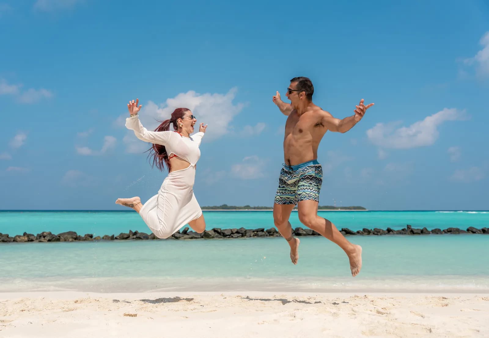 The couple by the turquoise sea